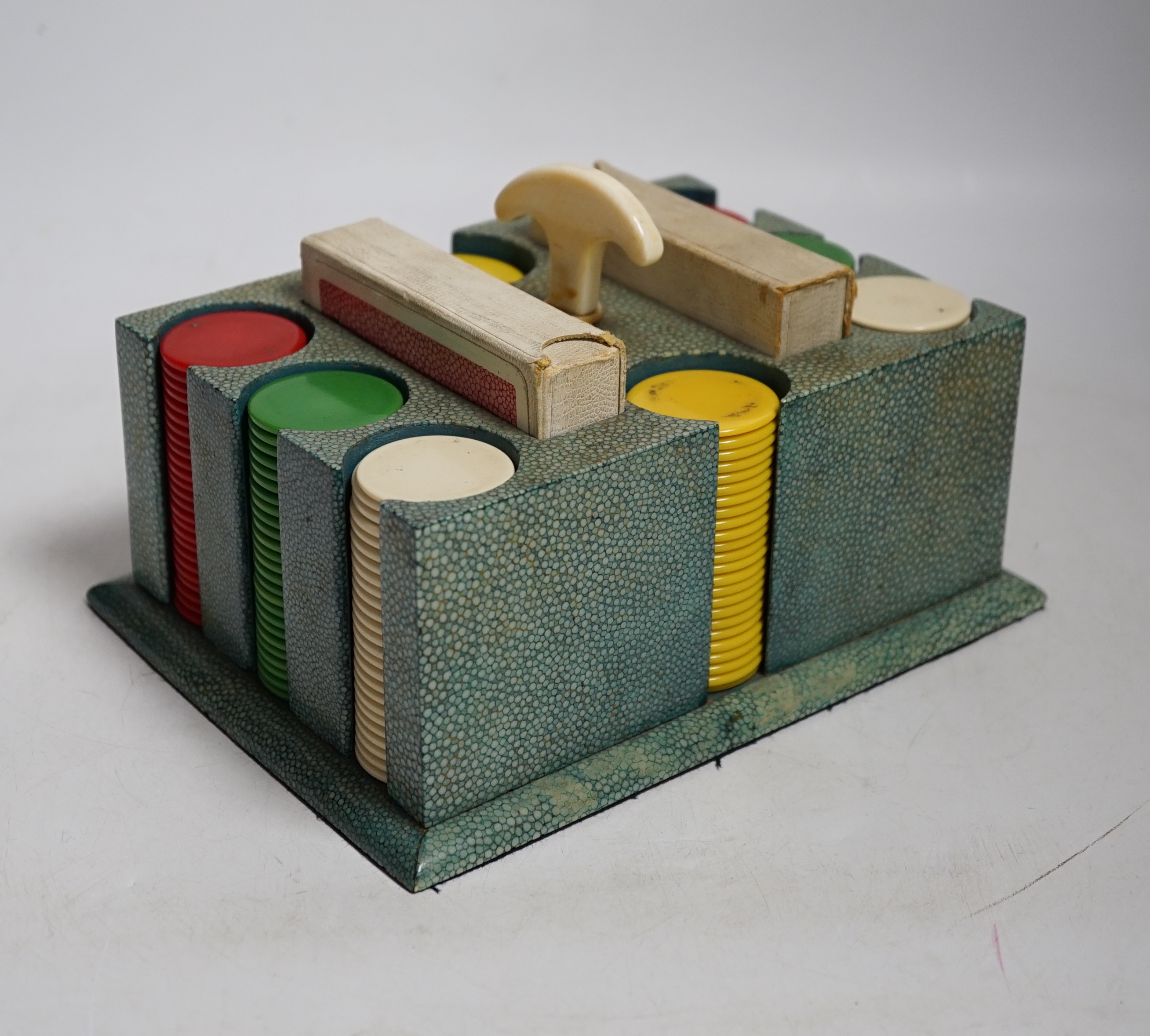 An Art Deco shagreen poker gaming set, ivory mounted with bakelite counters and two card packs by Goodall, London., CITES Submission reference 5SWXP1K4